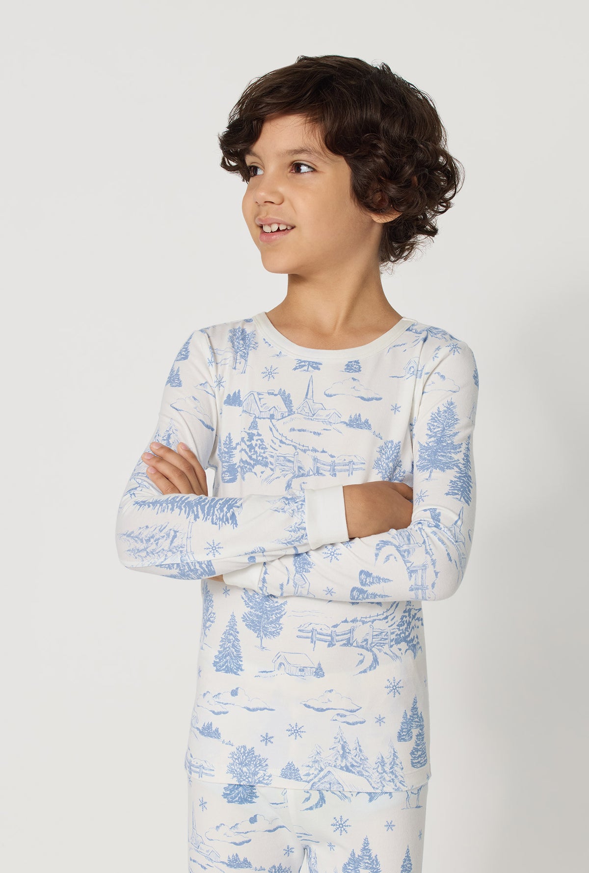 A boy wearing Winter Wonderland Long Sleeve Stretch Jersey Kids Pj Set closer look