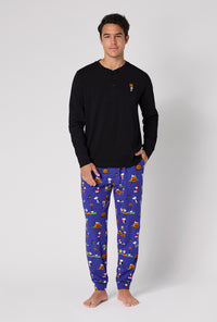 A Man Wearing Spooky Season Snoopy Men's Long Sleeve Henley And Jogger Stretch Jersey Pj Set