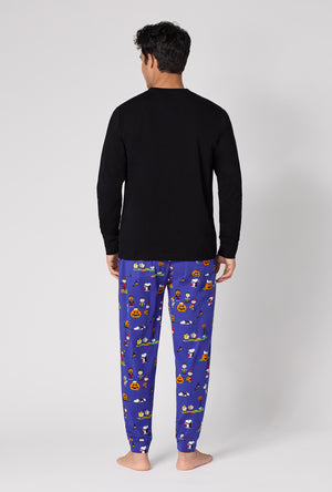 A Man Wearing Spooky Season Snoopy Men's Long Sleeve Henley And Jogger Stretch Jersey Pj Set in a back view pose