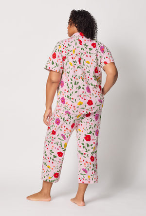 A lady wearing plus size Sunlit Floral Short Sleeve Classic Stretch Jersey Cropped Pj Set