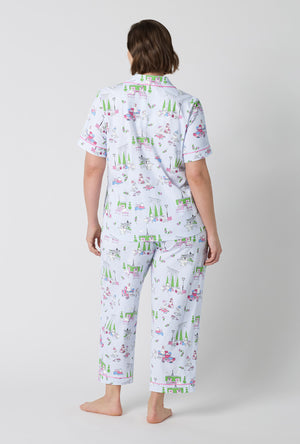 A Lady Wearing Plus Size Belle Vie Short Sleeve Classic Stretch Jersey Cropped Pj Set in a back view pose