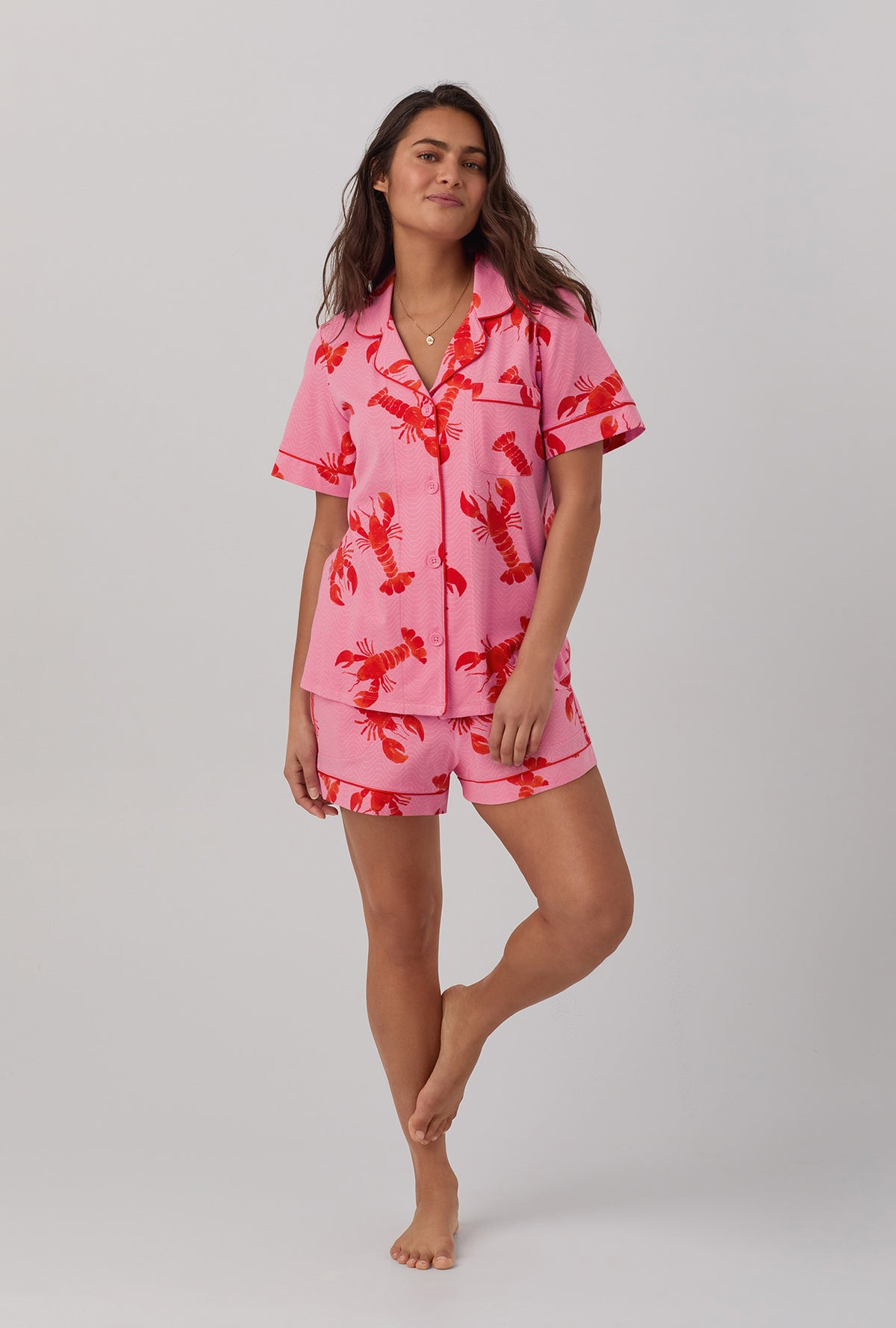 A lady wearing  pink  Short Sleeve Classic Shorty Stretch Jersey PJ Set with Lobster Fest print.