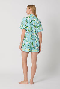 A Lady Wearing Short Sleeve Classic Shorty Stretch Jersey PJ Set with Belle Blossoms Print Back View