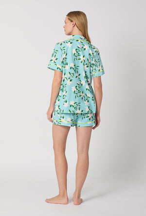 A Lady Wearing Short Sleeve Classic Shorty Stretch Jersey PJ Set with Belle Blossoms Print Back View