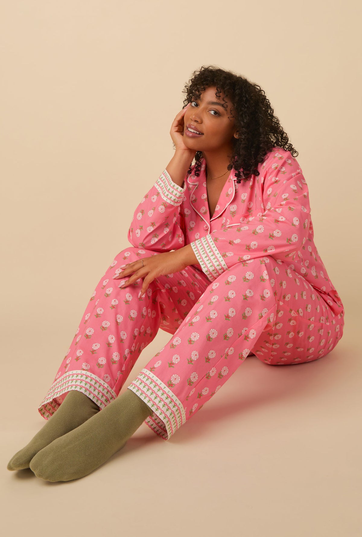 A lady wearing long sleeve classic woven cotton poplin pj set with monarch flowers print