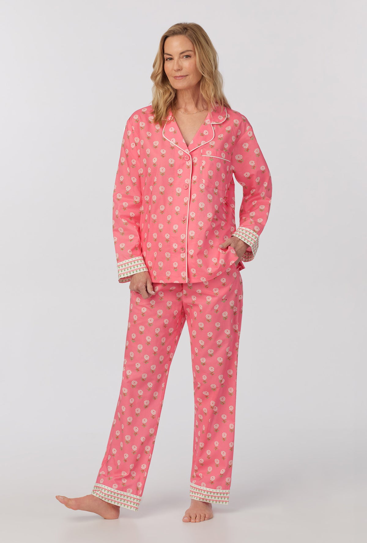 A lady wearing long sleeve classic woven cotton poplin pj set with monarch flowers print