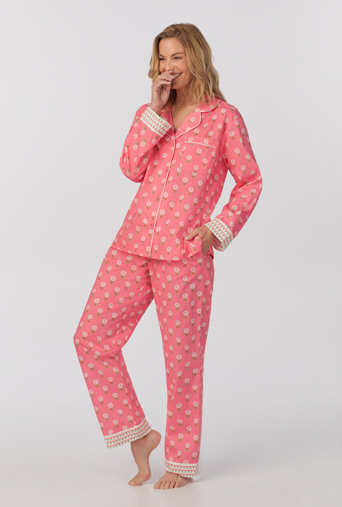 A lady wearing long sleeve classic woven cotton poplin pj set with monarch flowers print