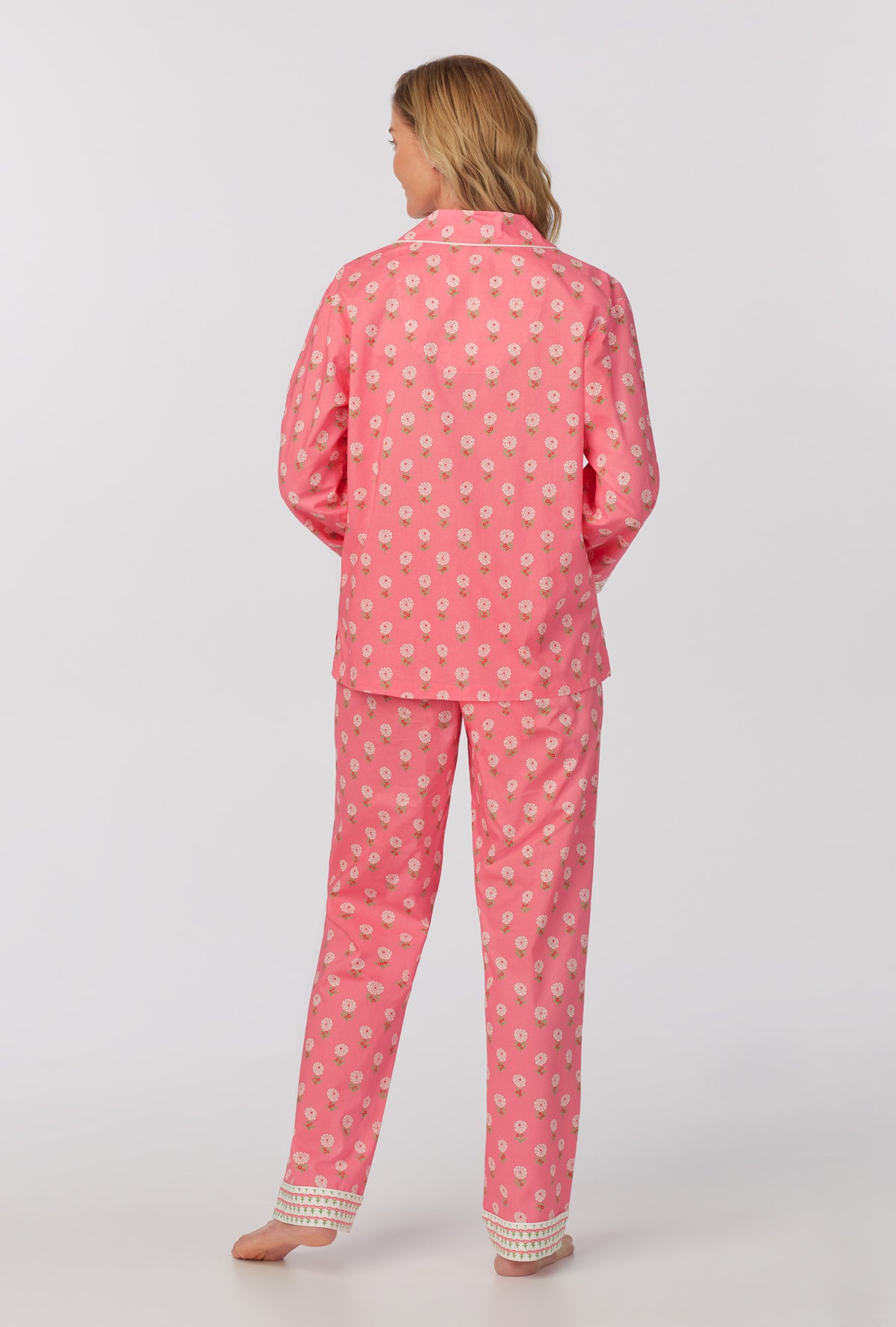 A lady wearing long sleeve classic woven cotton poplin pj set with monarch flowers print