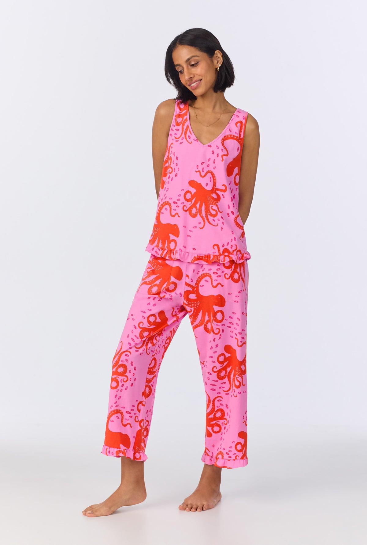 A lady wearing Sea Dreamers Ruffle Tank Stretch Cropped PJ Set