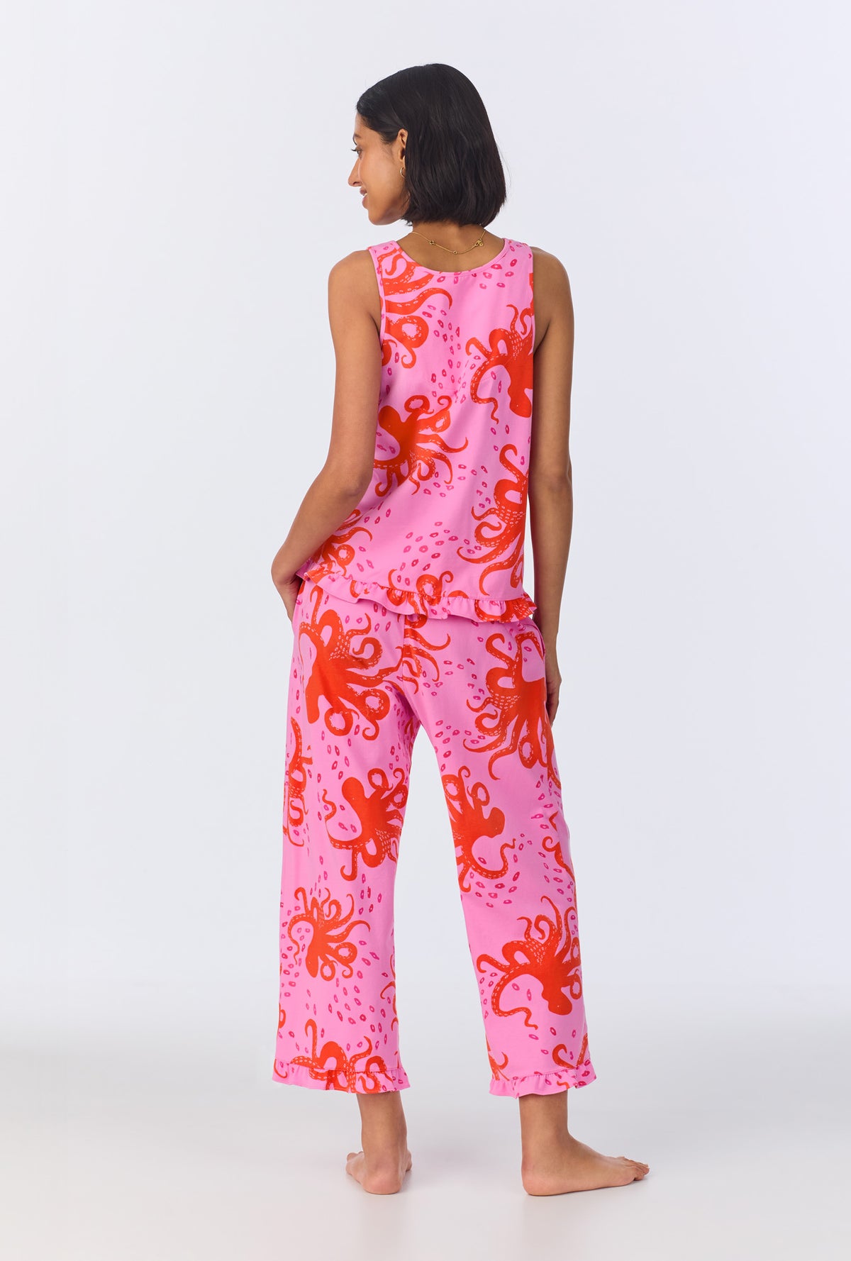 A lady wearing Sea Dreamers Ruffle Tank Stretch Cropped PJ Set