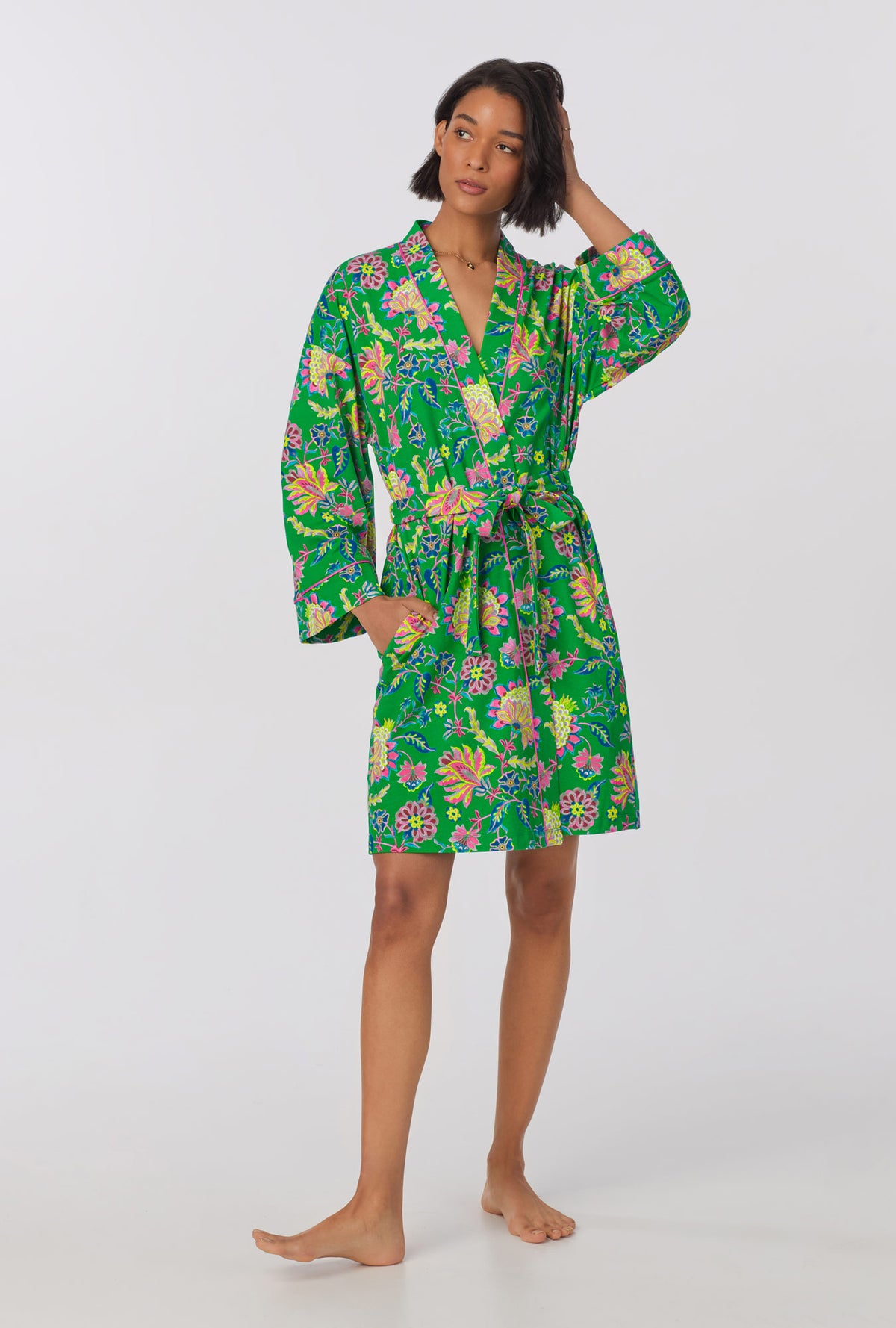 A lady wearing Banded Collar Stretch Jersey Robe with royal garden print