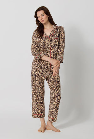 A lady wearing Wild At Heart 3/4 Sleeve Classic Stretch Jersey Cropped Pj Set looking down