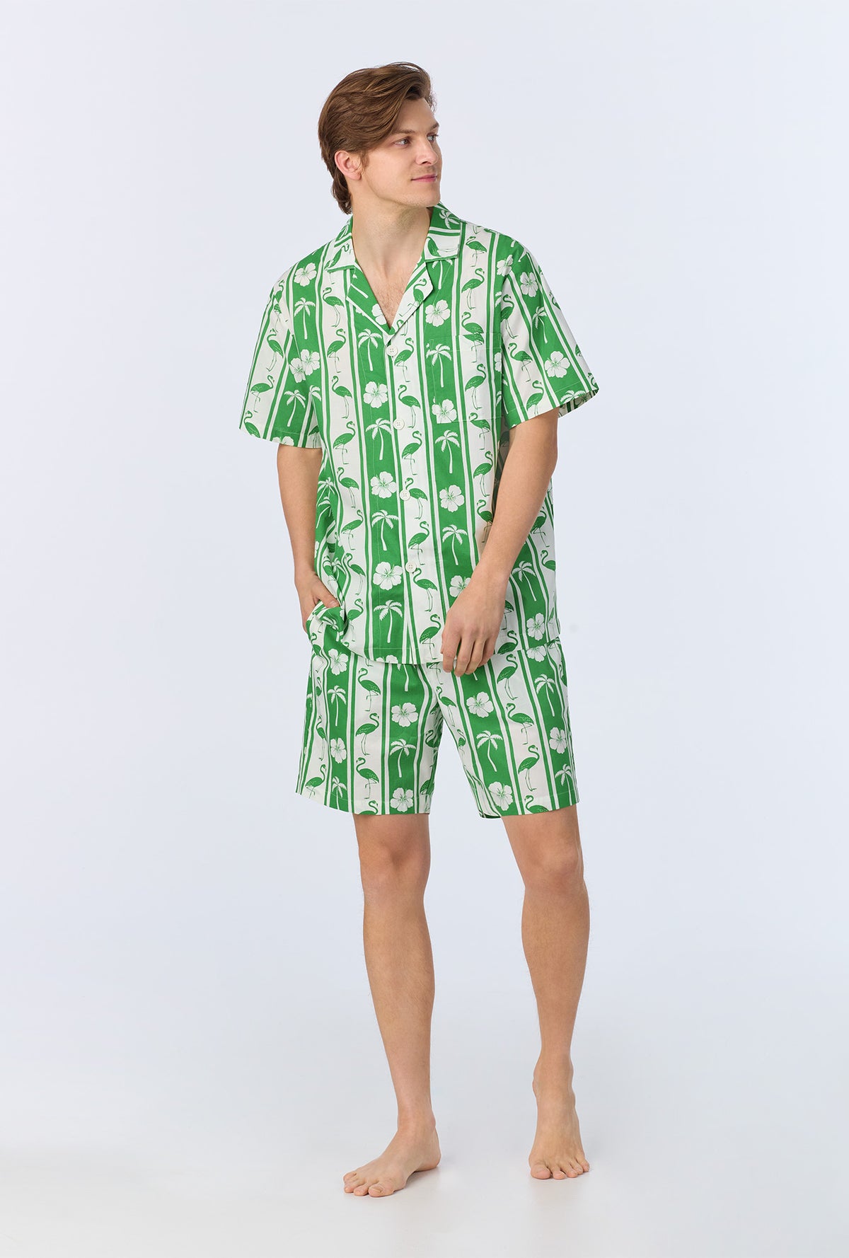 A man wearing Aloha Stripe Men&#39;s Short Sleeve Notch Woven Cotton Poplin Boxer PJ Set