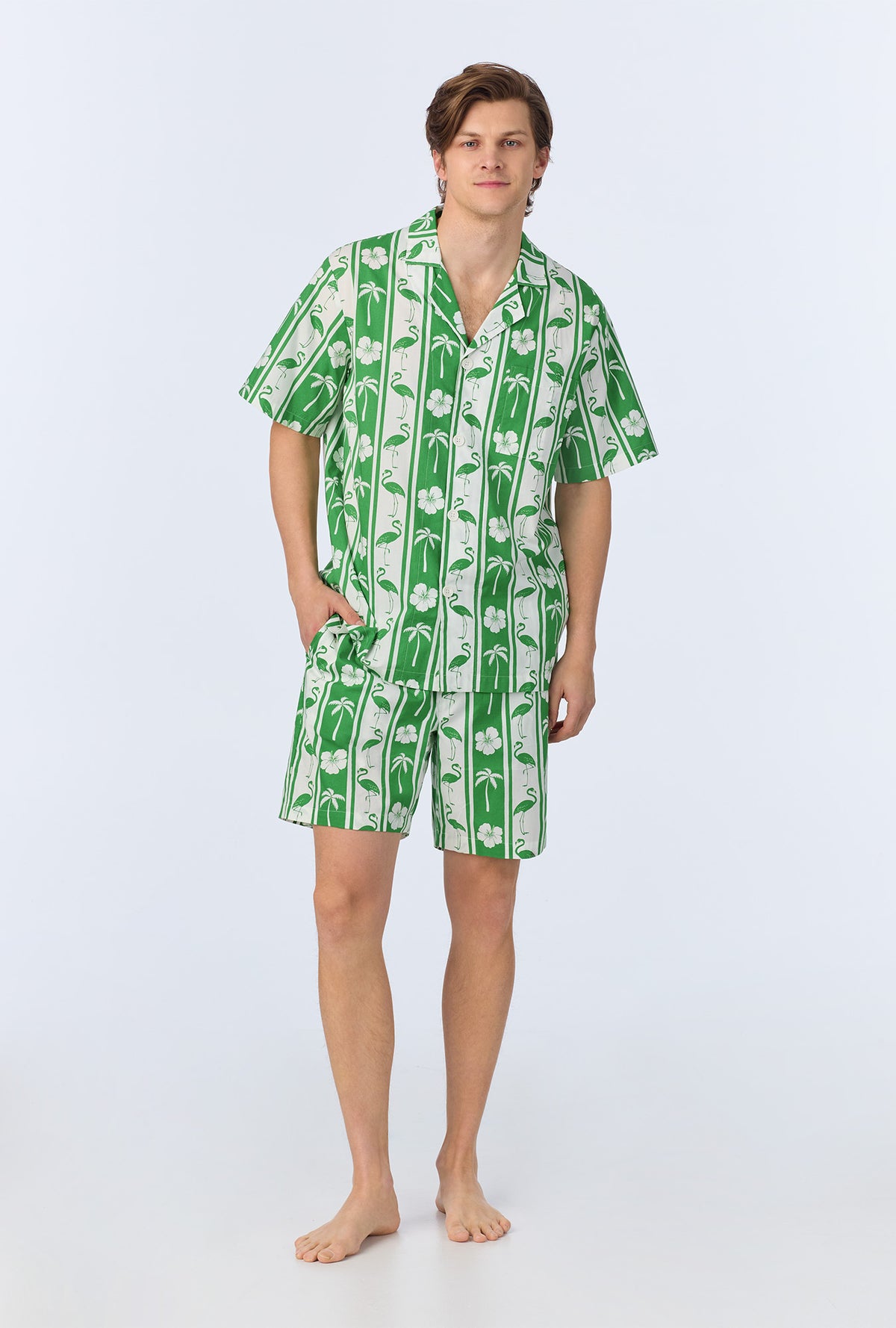A man wearing Aloha Stripe Men&#39;s Short Sleeve Notch Woven Cotton Poplin Boxer PJ Set