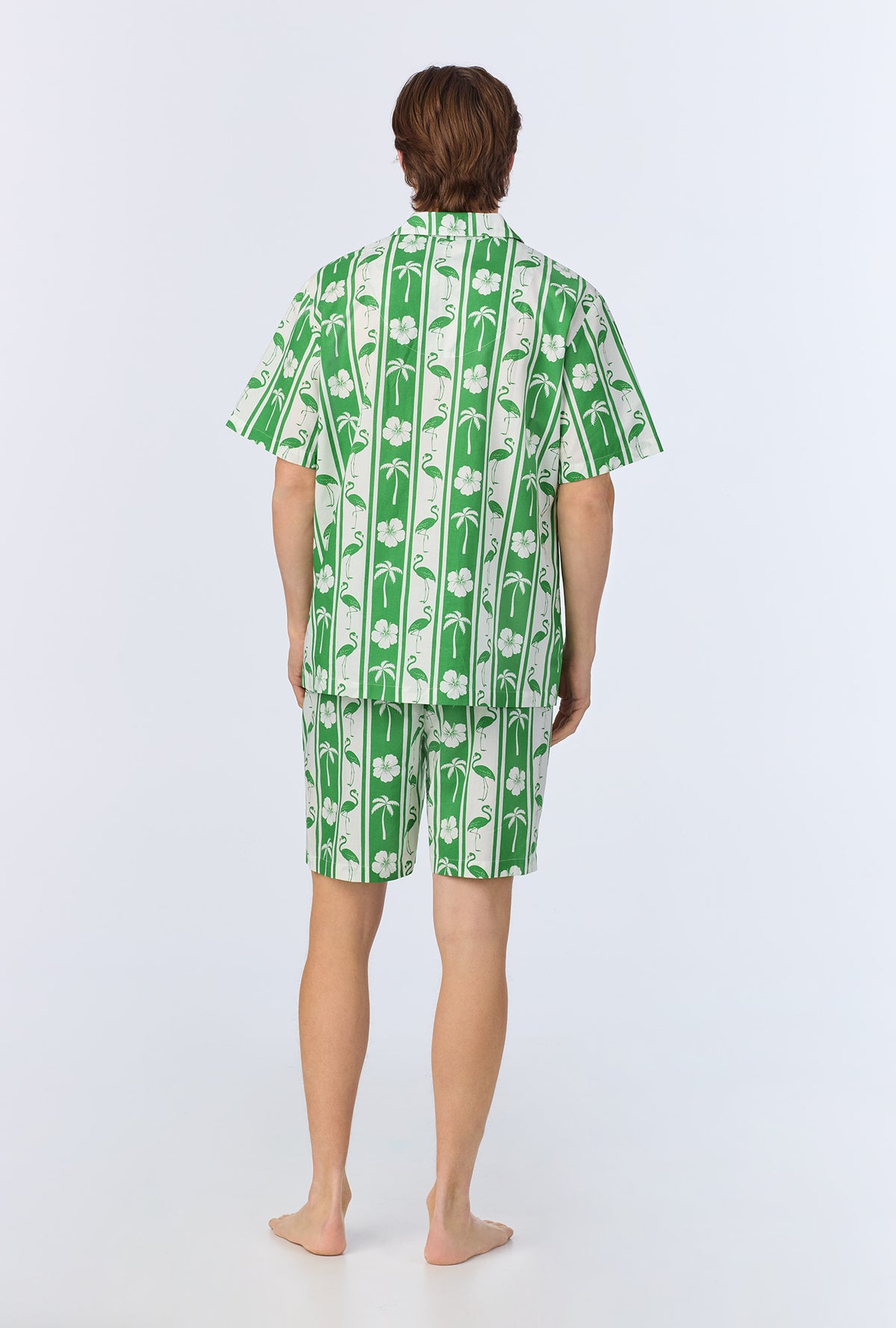 A man wearing Aloha Stripe Men&#39;s Short Sleeve Notch Woven Cotton Poplin Boxer PJ Set