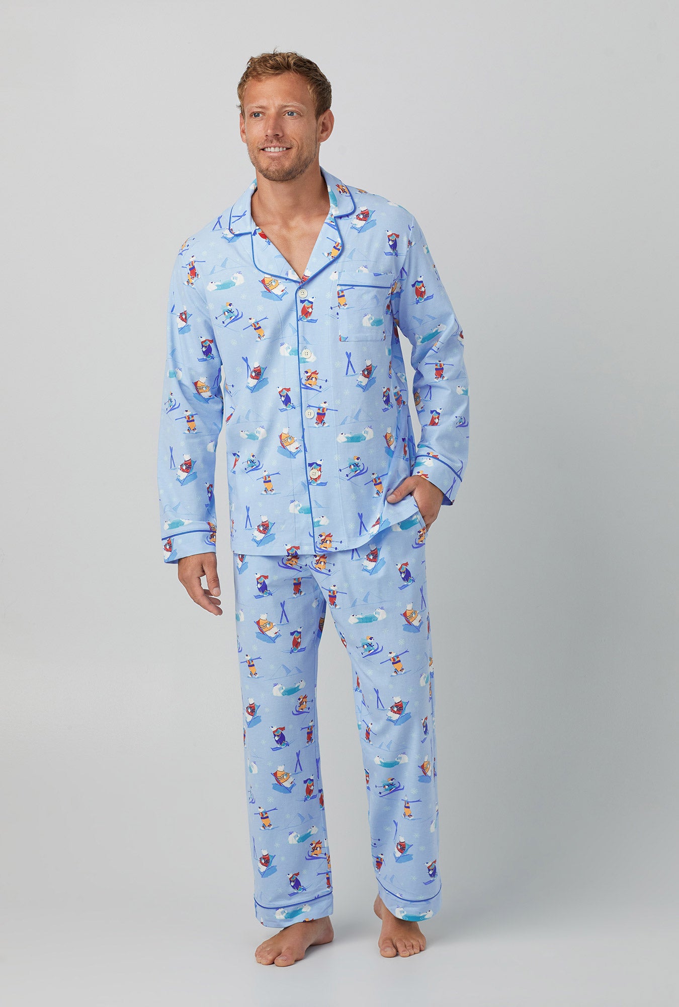 A man wearing light blue  Long Sleeve Classic Stretch Jersey PJ Set with Backcountry Bears print