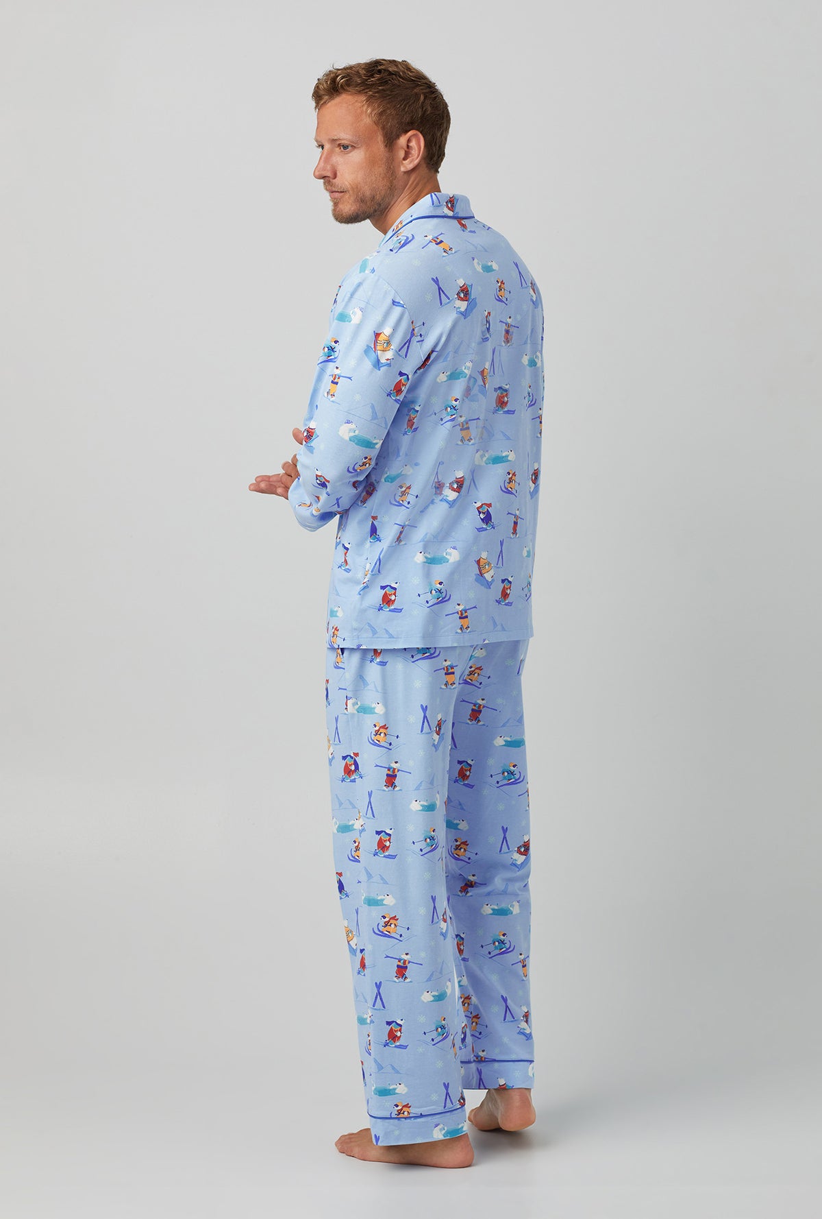 A man wearing light blue  Long Sleeve Classic Stretch Jersey PJ Set with Backcountry Bears print