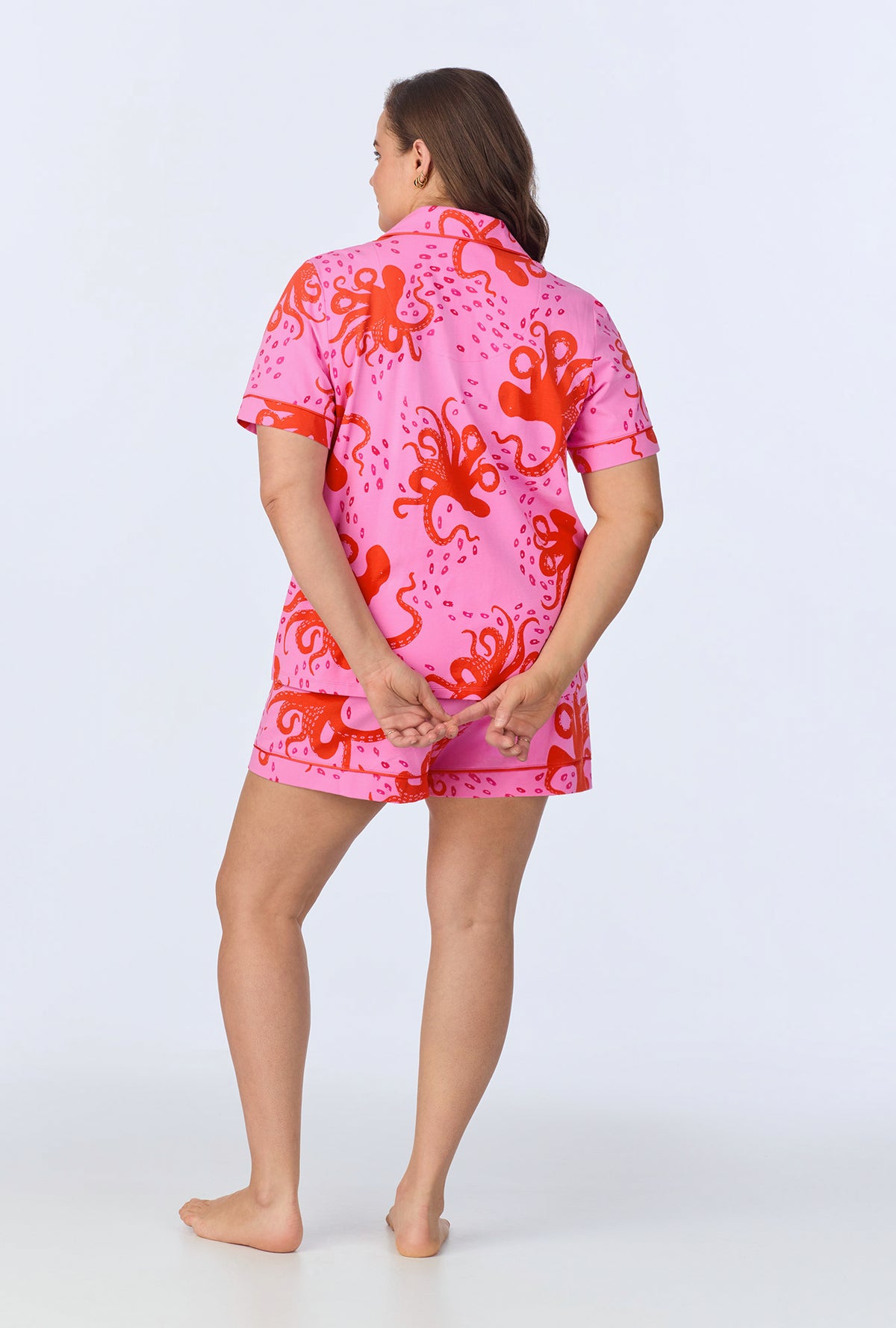 A lady wearing Sea Dreamers Short Sleeve Classic Shorty Stretch Jersey PJ Set