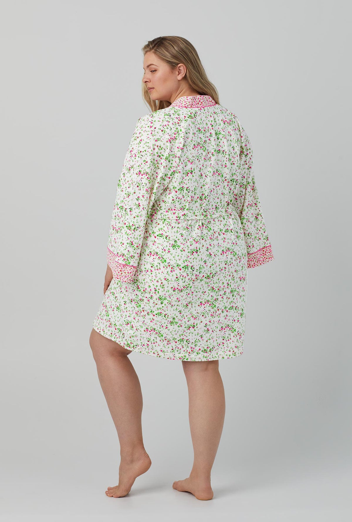 A lady wearing white Collar Stretch Jersey Robe with Nellie print