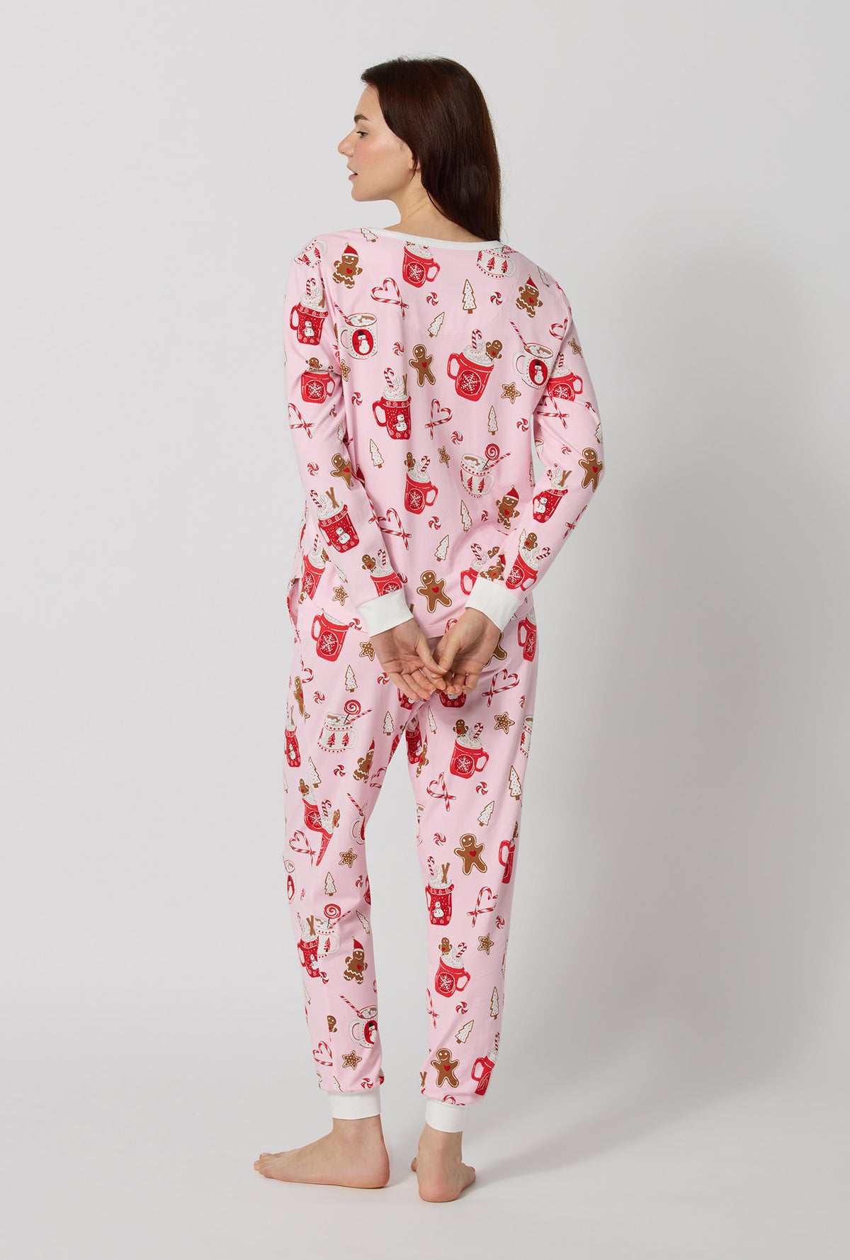 A lady wearing Candy And Cocoa Long Sleeve Pullover Crew And Jogger Stretch Jersey Pj Set back view