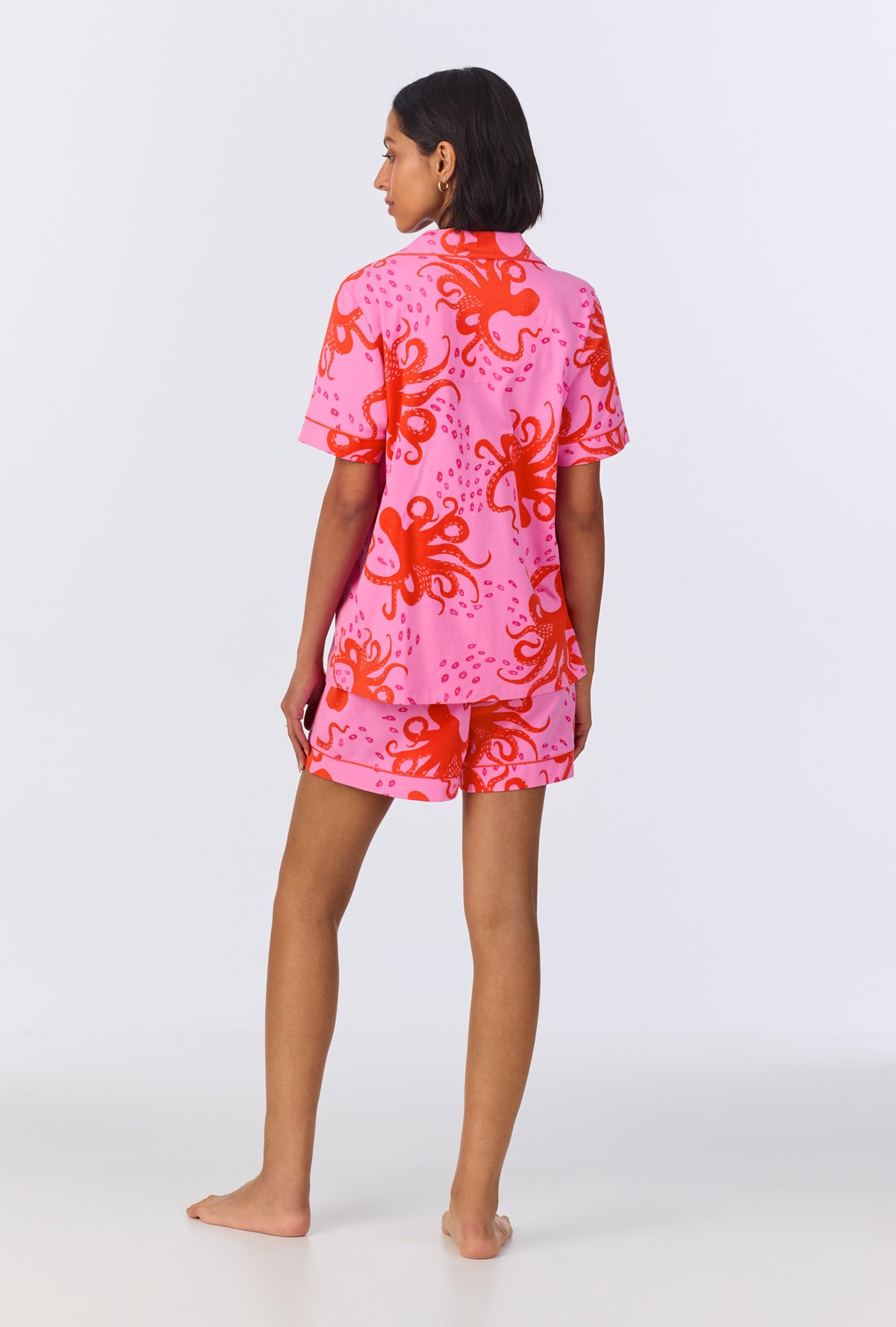 A lady wearing Sea Dreamers Short Sleeve Classic Shorty Stretch Jersey PJ Set