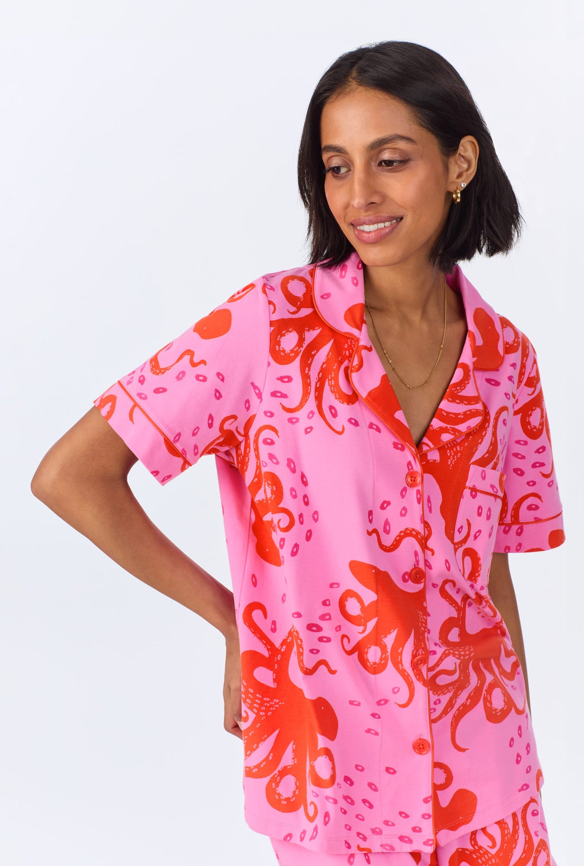 A lady wearing Sea Dreamers Short Sleeve Classic Shorty Stretch Jersey PJ Set