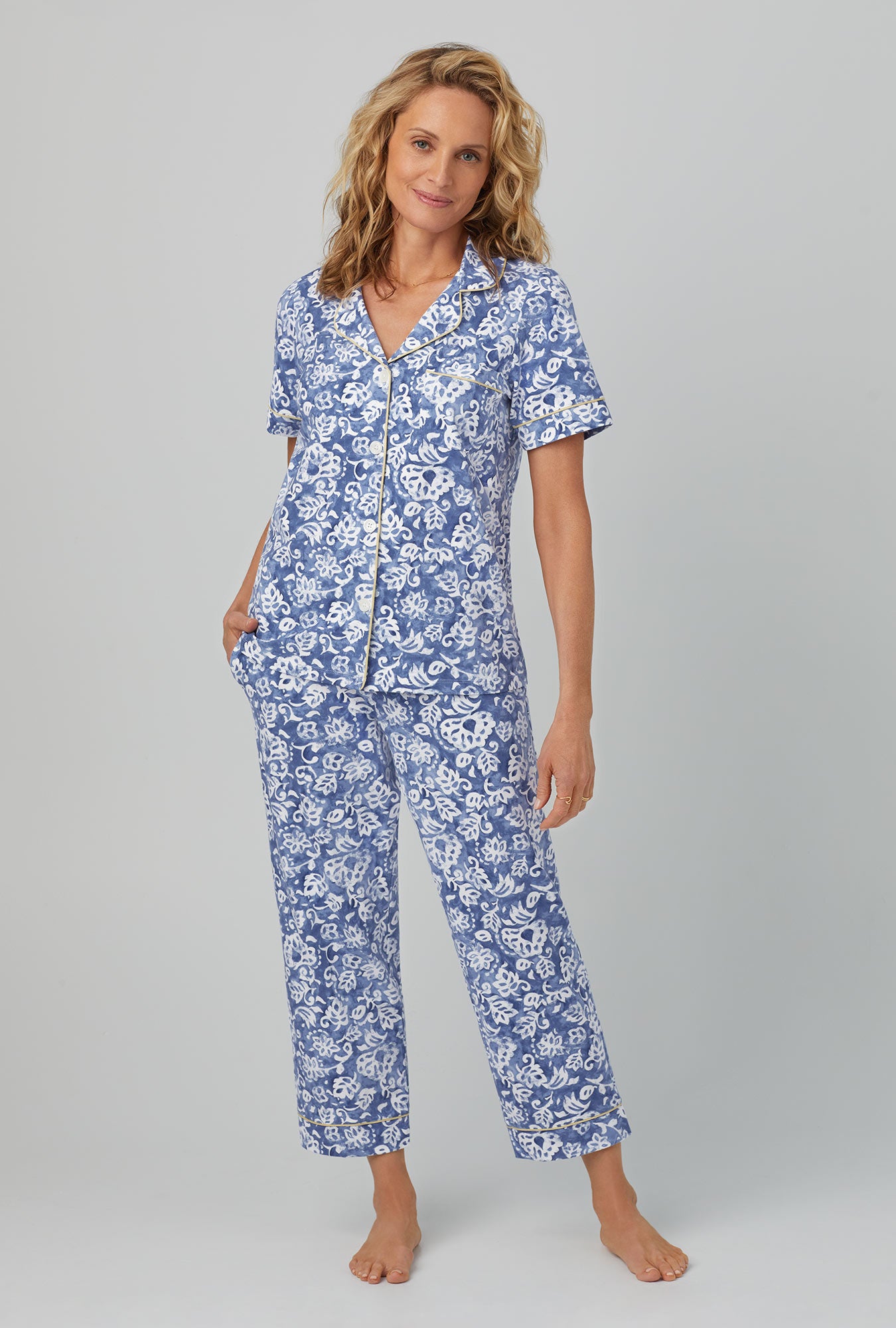 A lady wearing Short Sleeve Classic Stretch Jersey Cropped PJ Set with autumn eve print