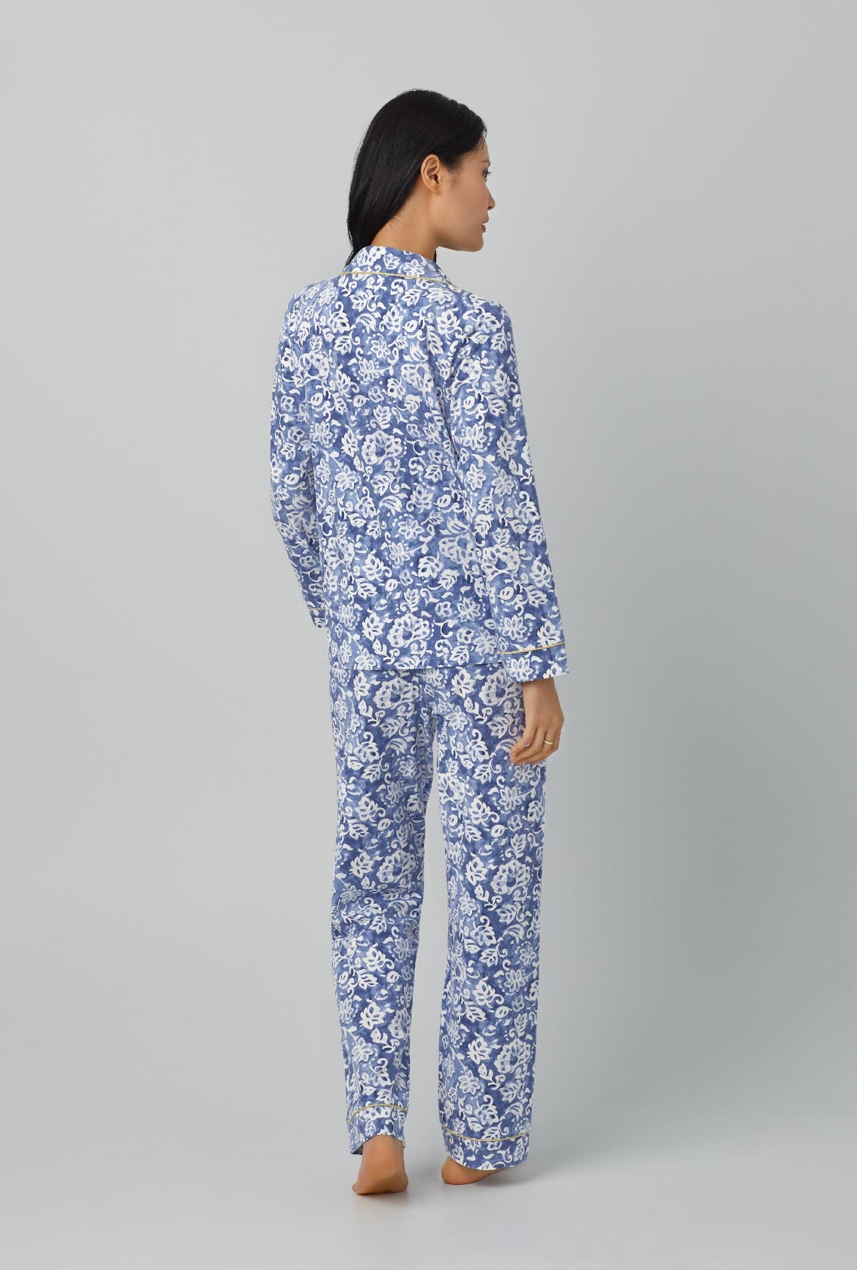 A lady wearing long sleeve classic stretch jersey pj set with autumn eve print