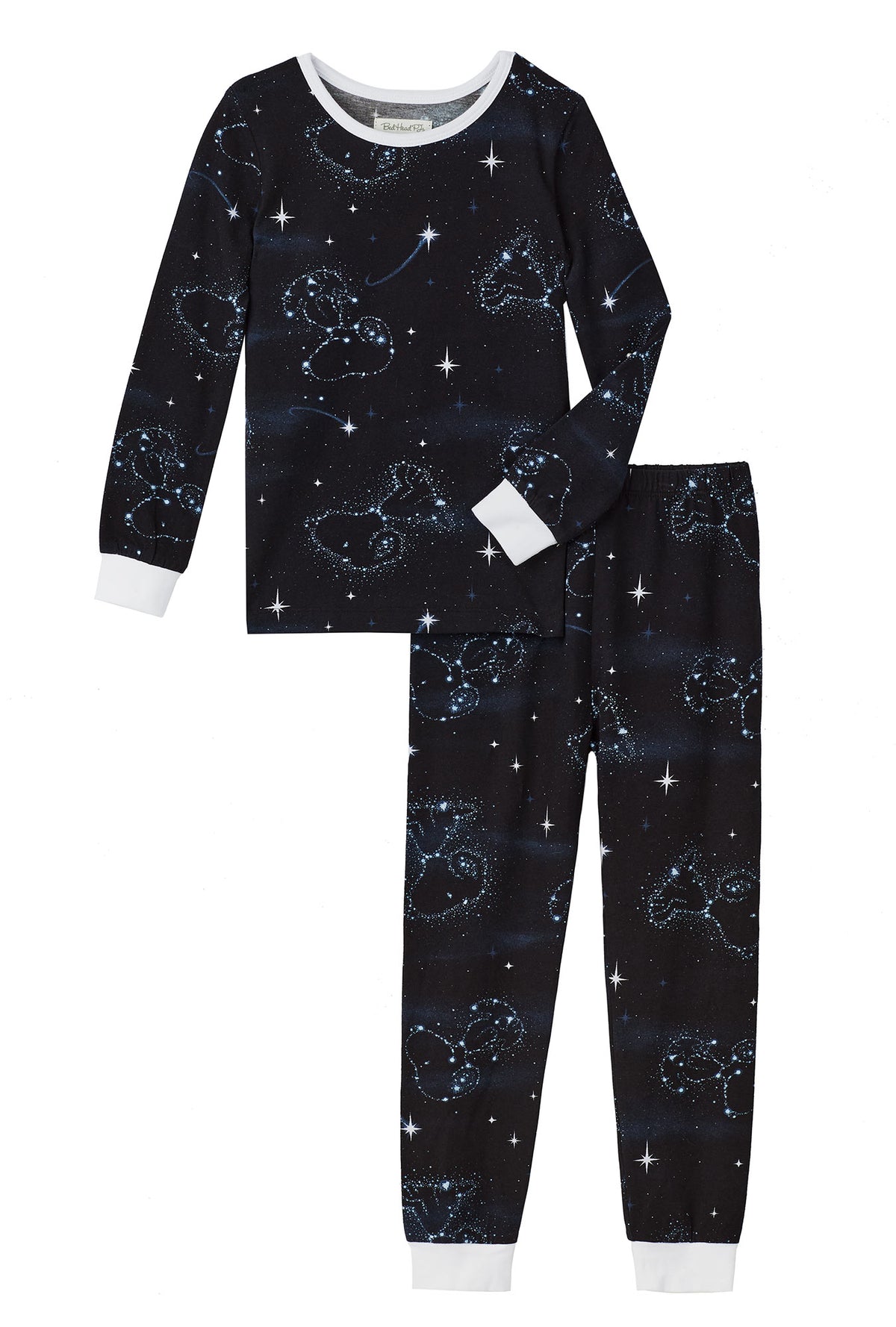 A girl wearing black long sleeve stretch jersey kids pj set with celestial snoopy print.