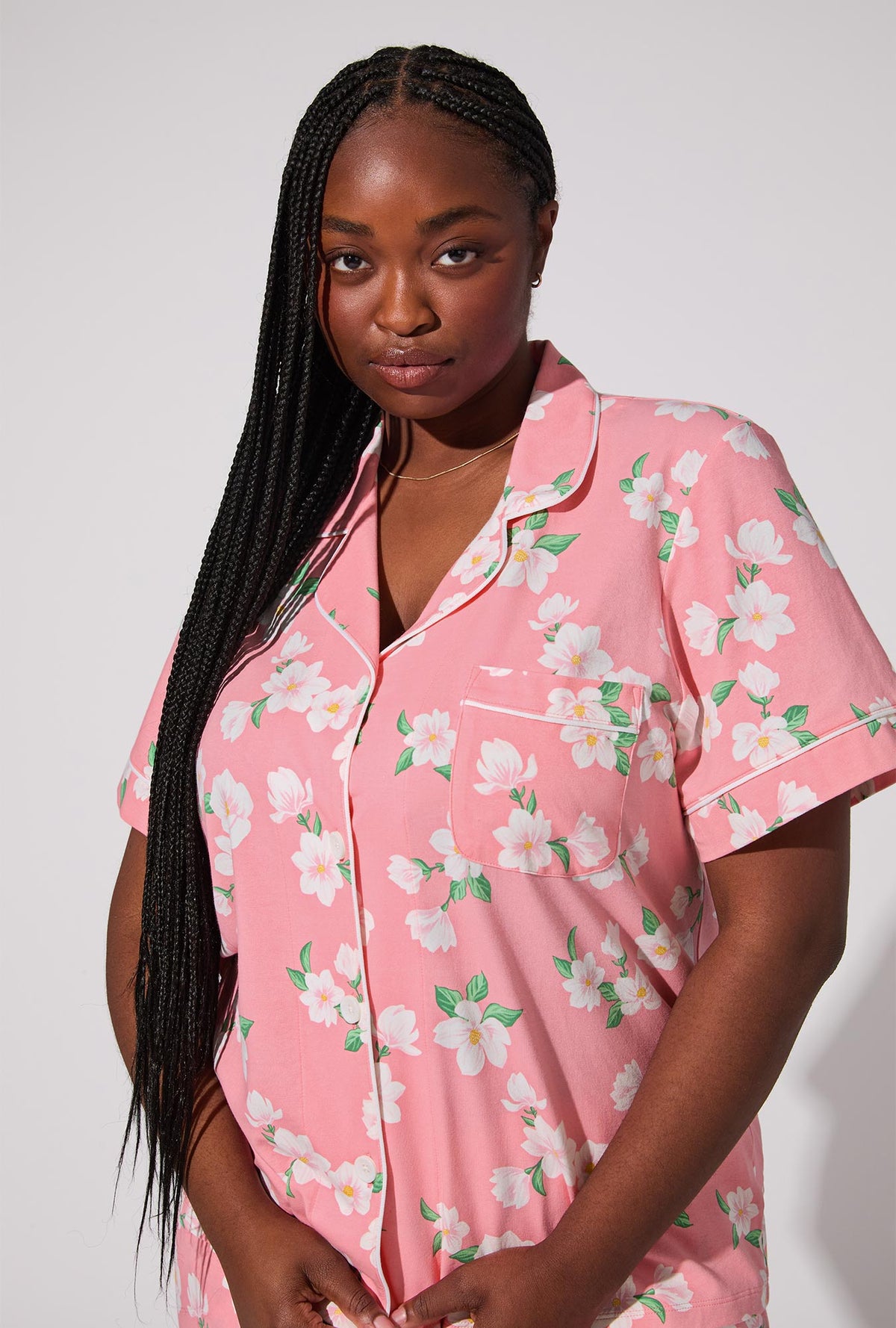 A lady wearing Pink Magnolias Short Sleeve Classic Stretch Jersey Cropped PJ Set