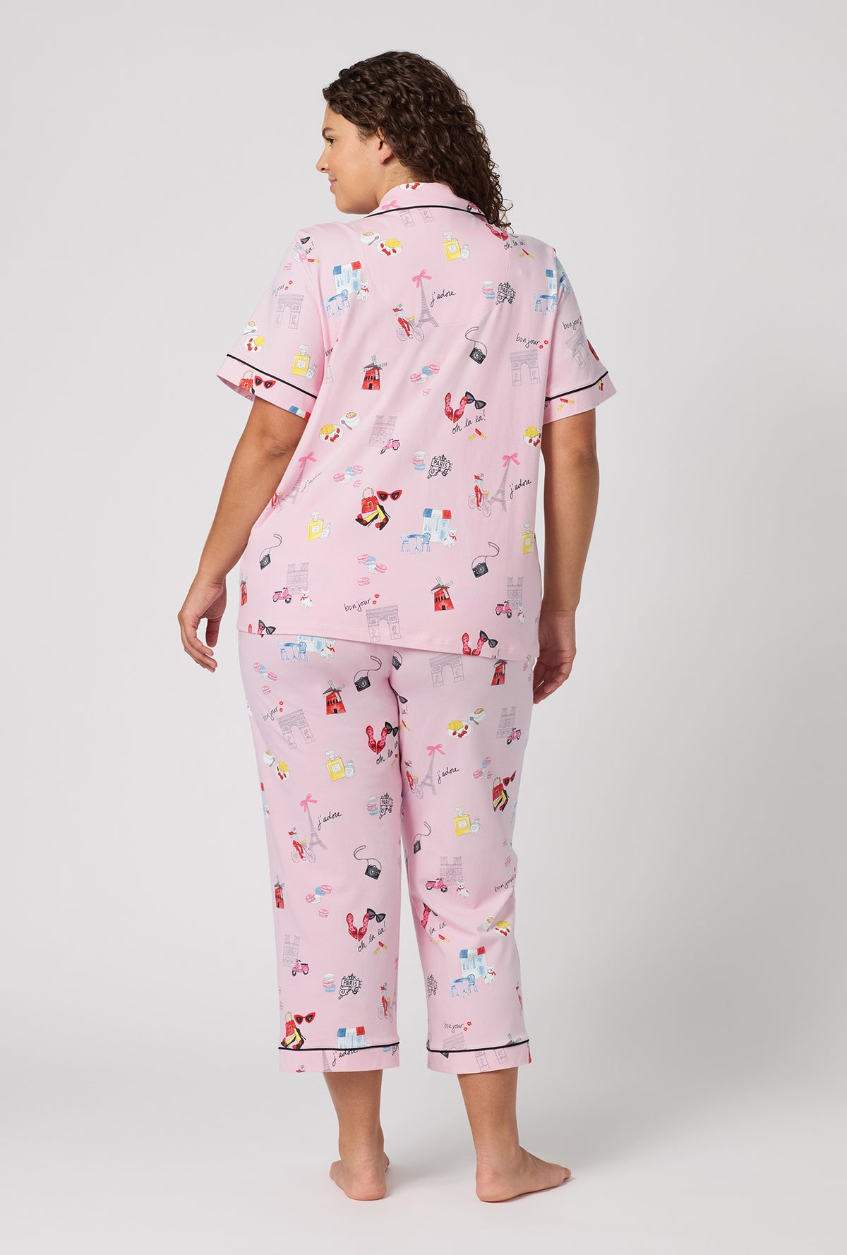 A Lady Wearing Plus Size J'adore Paris Short Sleeve Classic Stretch Jersey Cropped Pj Set in a back view pose