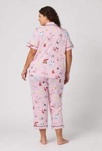 A Lady Wearing Plus Size J'adore Paris Short Sleeve Classic Stretch Jersey Cropped Pj Set in a back view pose