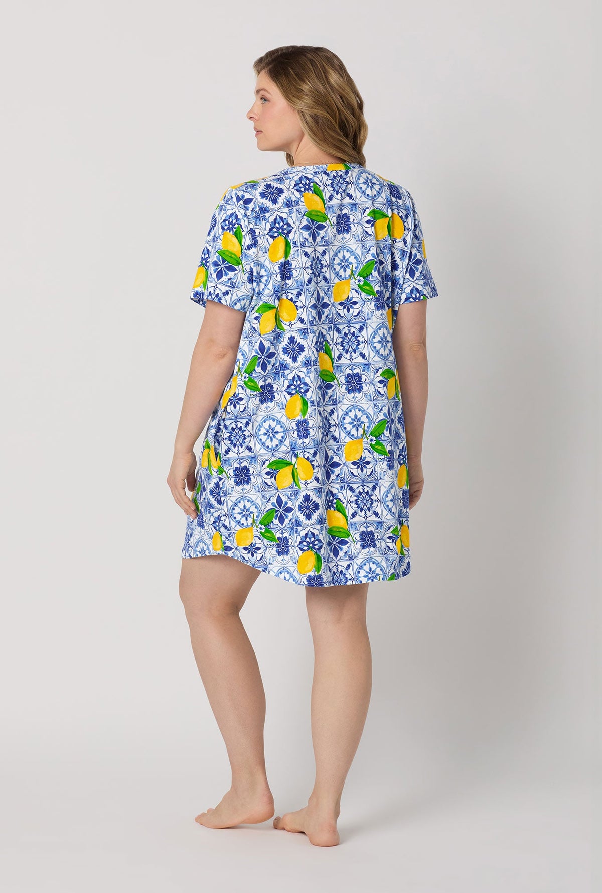 A lady wearing plus size Blue and  White Stretch Jersey T-Shirt Sleep Dress back view