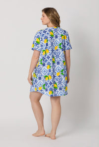 A lady wearing plus size Blue and  White Stretch Jersey T-Shirt Sleep Dress back view