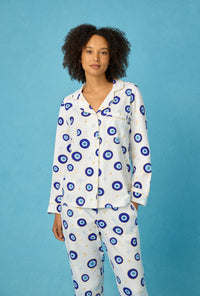 A Women Wearing Eyeconic Long Sleeve Classic Stretch Jersey Pj Set in a front facing pose against a blue background