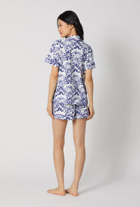 A lady wearing Under The Sea Short Sleeve Classic Shorty Stretch Jersey Pj Set back view