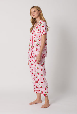 A Lady Wearing Berry Souffle Short Sleeve Classic Stretch Jersey Cropped PJ Set Side Angle View