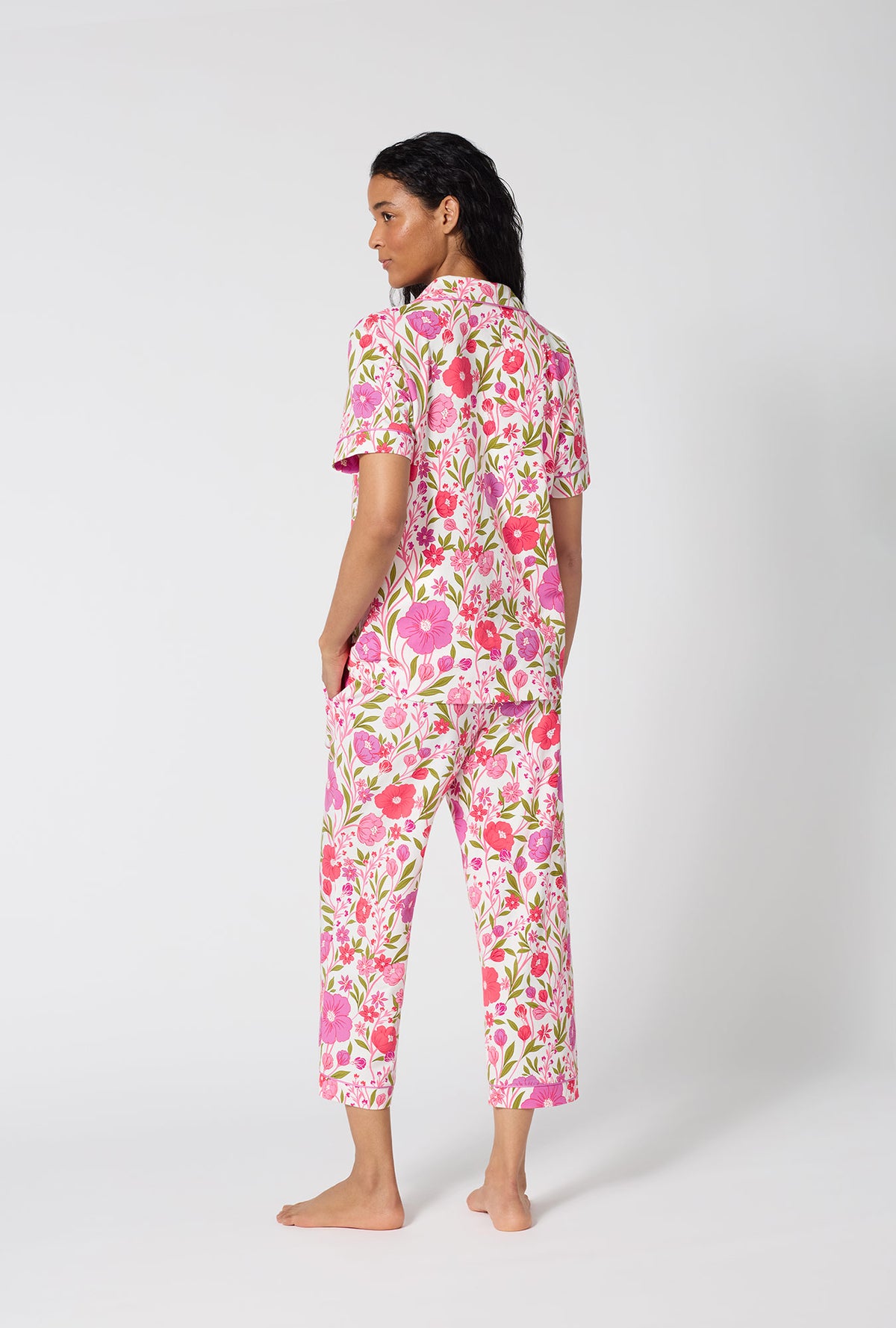 A Lady Wearing Josephine Short Sleeve Classic Stretch Jersey Cropped Pj Set in a back view pose