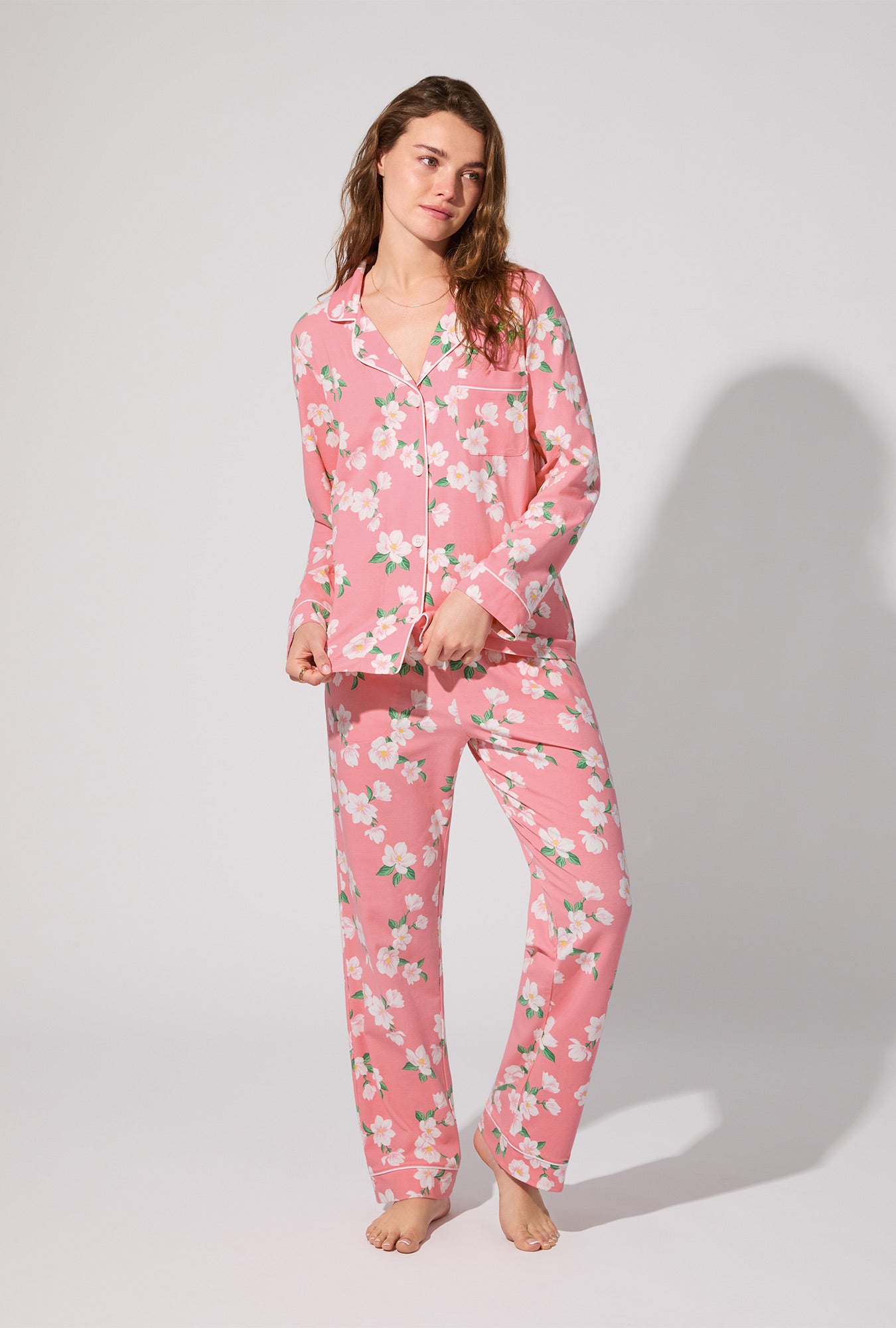 A lady wearing Pink Magnolias Long Sleeve Classic Stretch Jersey PJ Set