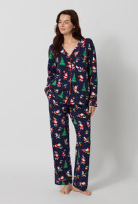 A lady wearing Santa's Night Out Long Sleeve Classic Stretch Jersey Pj Set looking side 