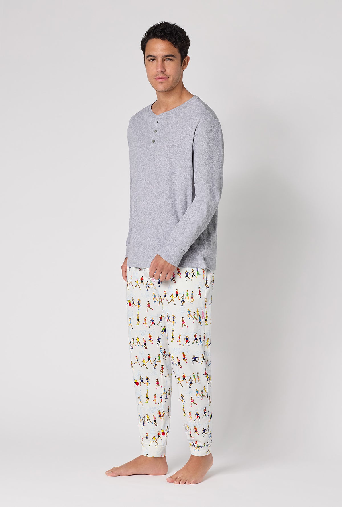A Man wearing Run Nyc Run Men's Long Sleeve Henley And Jogger Stretch Jersey Pj Set
