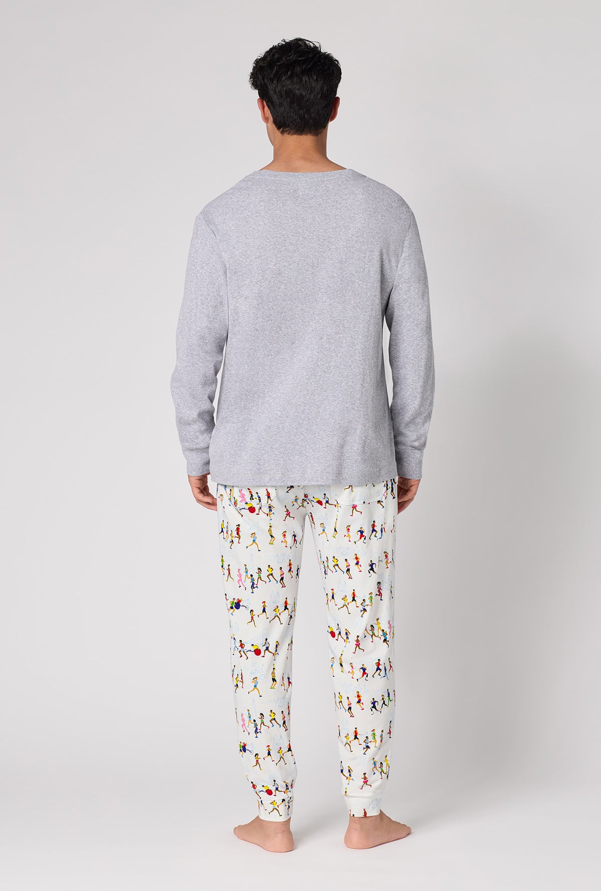 A Man wearing Run Nyc Run Men's Long Sleeve Henley And Jogger Stretch Jersey Pj Set back view