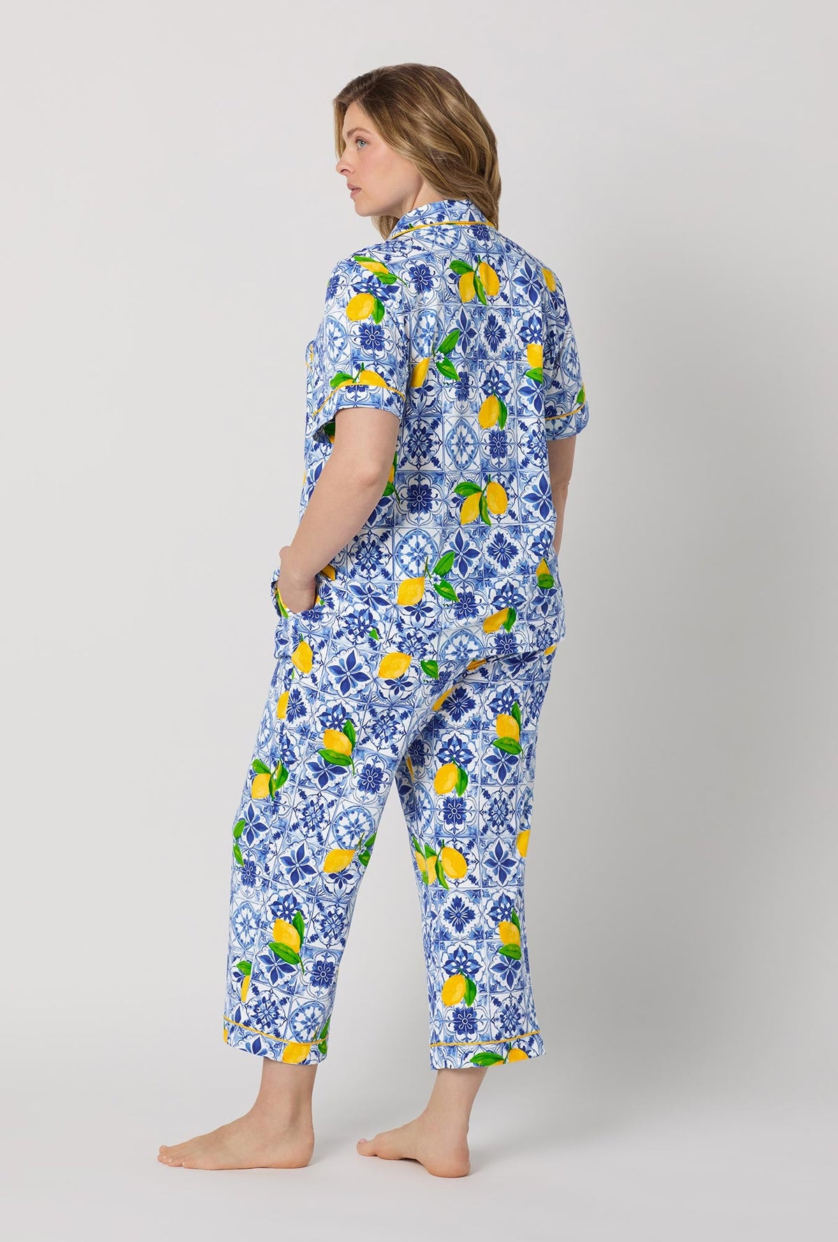A lady wearing plus size Blue and  White Short Sleeve Classic Stretch Jersey Cropped Pj Set back view