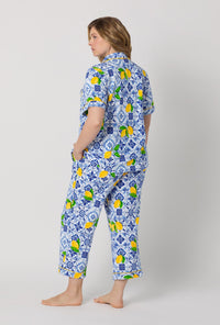 A lady wearing plus size Blue and  White Short Sleeve Classic Stretch Jersey Cropped Pj Set back view