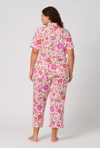 A Lady Wearing Plus Size Josephine Short Sleeve Classic Stretch Jersey Cropped Pj Set in a back view pose