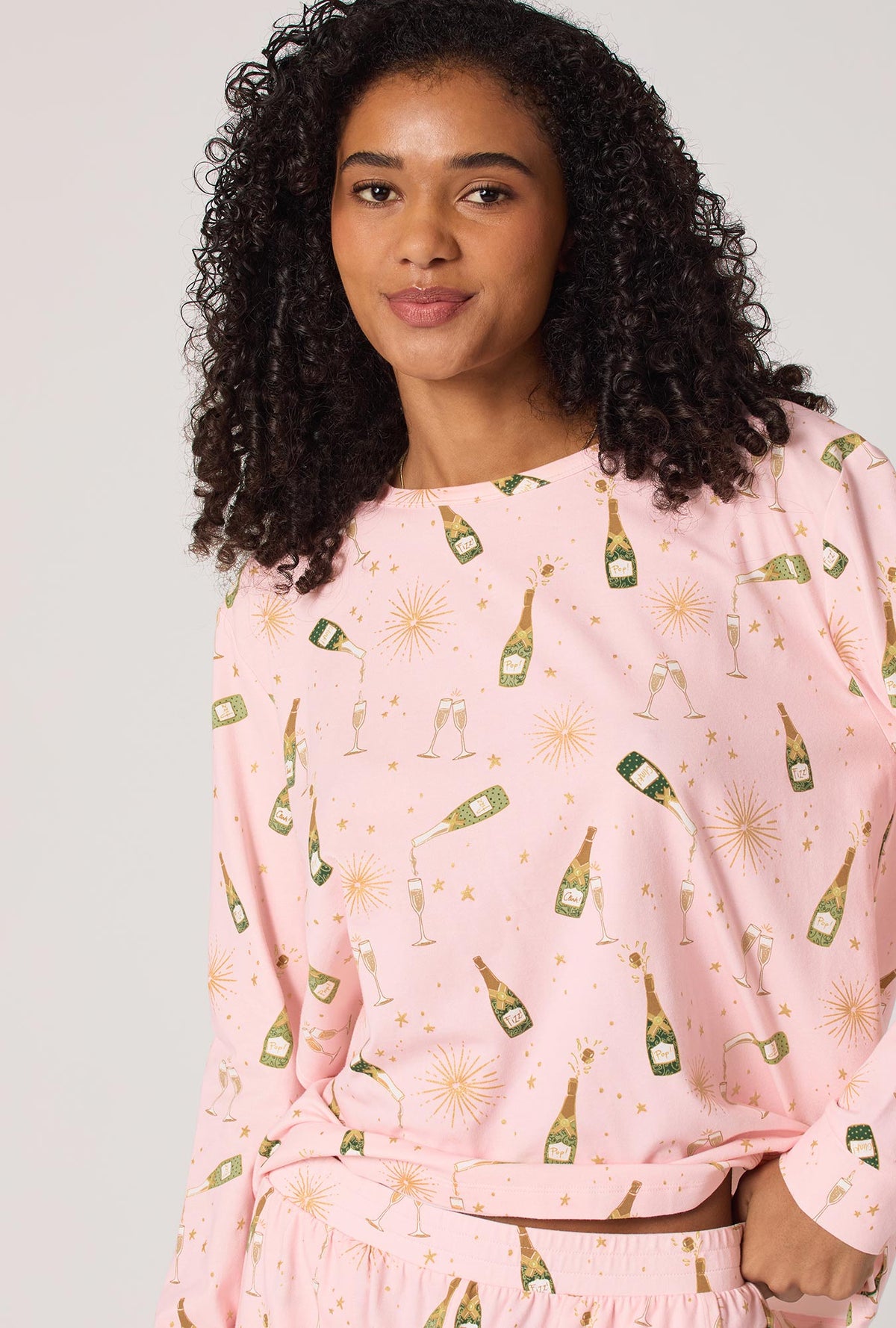 A Lady wearing Pop Fizz Clink Long Sleeve Pullover Crew And Jogger Stretch Jersey Pj Set