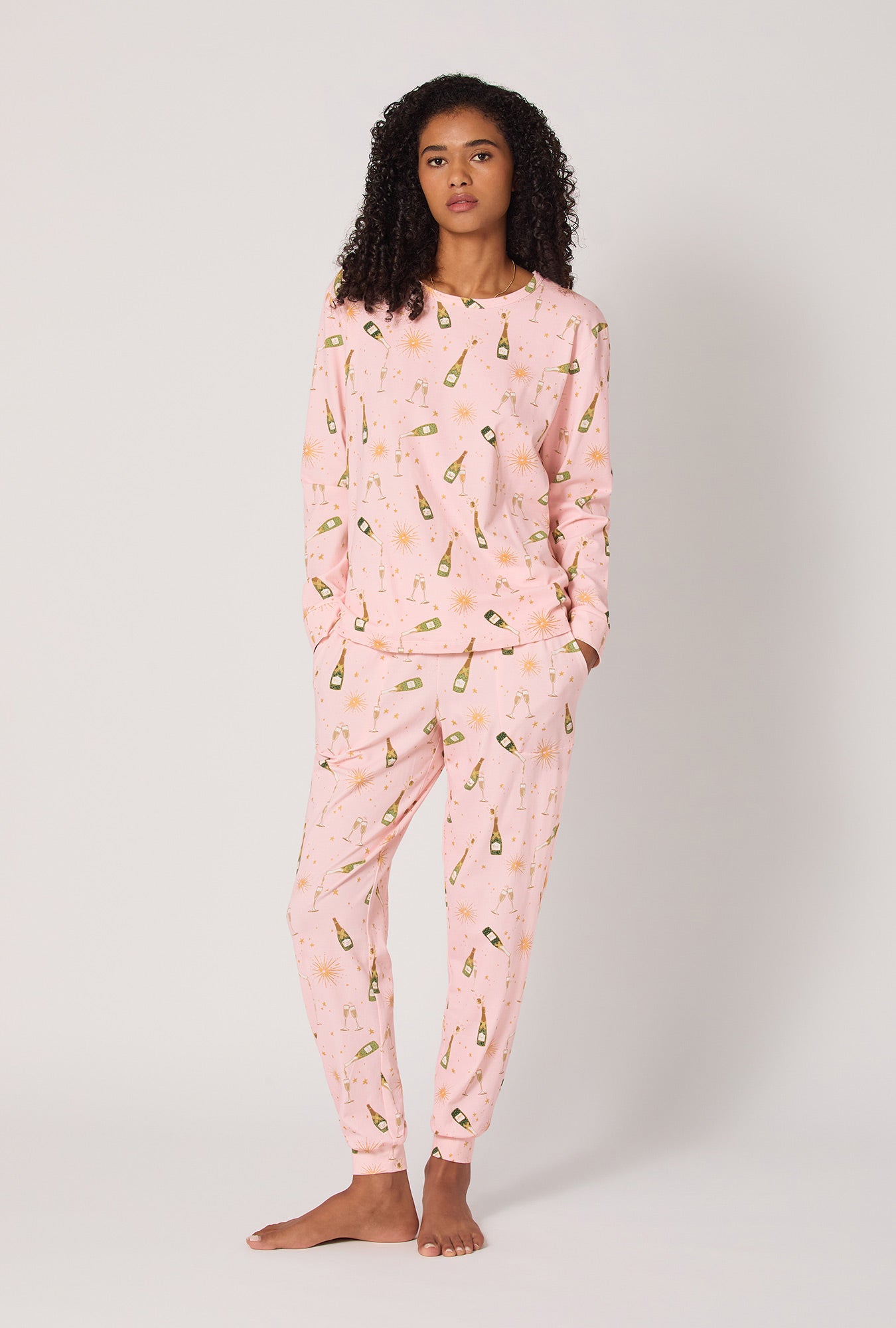 A Lady wearing Pop Fizz Clink Long Sleeve Pullover Crew And Jogger Stretch Jersey Pj Set