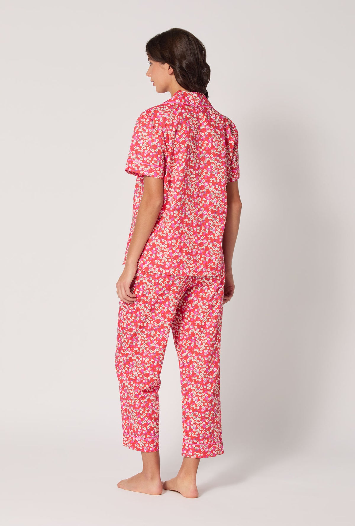 A Lady wearing Mitsi Short Sleeve Classic Woven Tana Lawn® Cropped Pj Set Made With Liberty Fabric