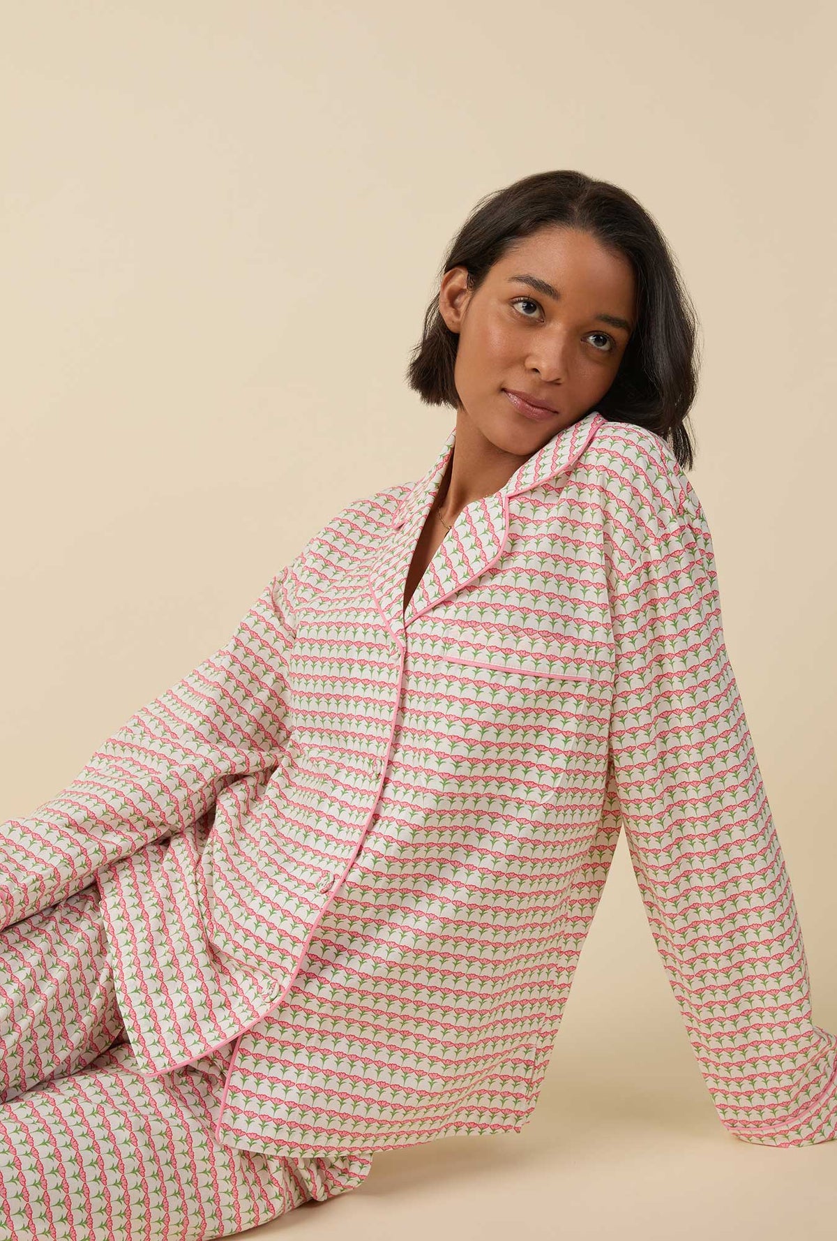 A lady wearing long sleeve classic woven cotton poplin pj set with princess tulips print