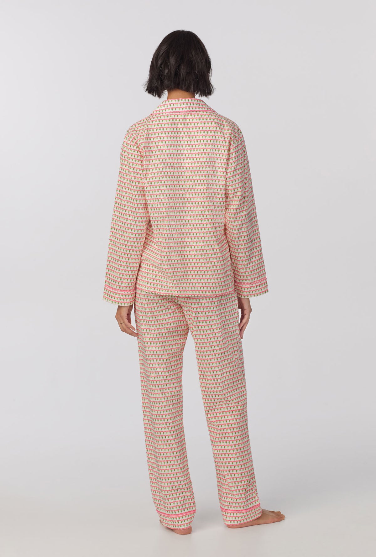 A lady wearing long sleeve classic woven cotton poplin pj set with princess tulips print